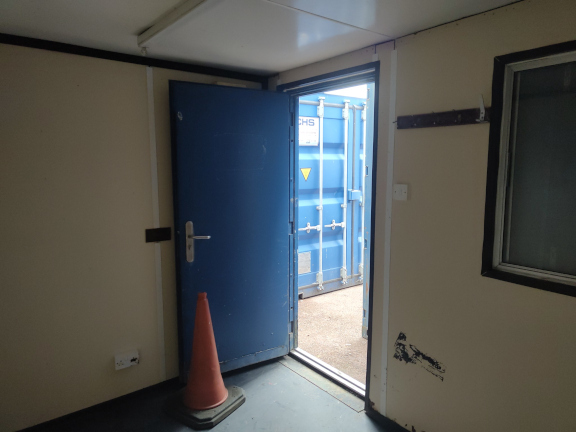 A 20 x 8ft 50/50 Office/Store in Ex-Hire Fleet condition, located in Glasgow