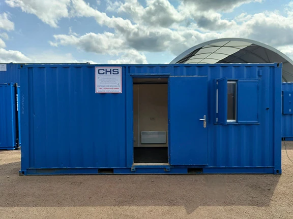 Portable office unit with door and window shutters open